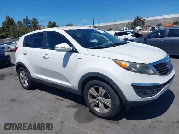 2012 Kia Sportage LX z VIN KNDPBCA21C7297706, wystawiony jako IAAI lot #42804922 z przebiegiem 187 840 mil mil oraz . Historia ofert i sprzedaży dostępna na DreamBid. Obrazek 1.