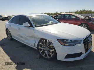 2015 Audi A6 Prestige with VIN WAUHGAFC7FN030286, listed as a Copart auction lot 71237874 with 74,334 mi miles and Salvage title. Bid and sale history available at DreamBid. Image 4.
