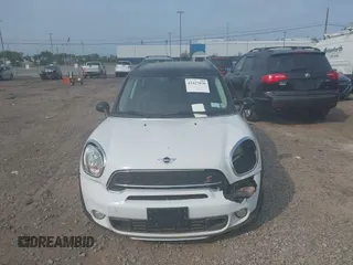 2015 MINI Countryman S with VIN WMWZC5C59FWM18935, listed as a IAAI auction lot 42427878 with 121,410 mi miles and . Bid and sale history available at DreamBid. Image 12.