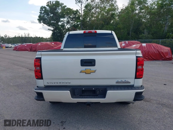 2014 Chevrolet Silverado 1500 High Country with VIN 3GCUKTEC4EG401571, listed as a IAAI auction lot 41984349 with 104,221 mi miles and . Bid and sale history available at DreamBid. Image 15.