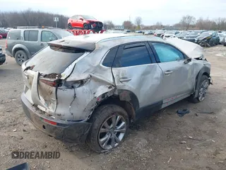 2023 Mazda CX-30 S Premium with VIN 3MVDMBDMXPM563500, listed as a IAAI auction lot 42092423 with 9,148 mi miles and . Bid and sale history available at DreamBid. Image 4.