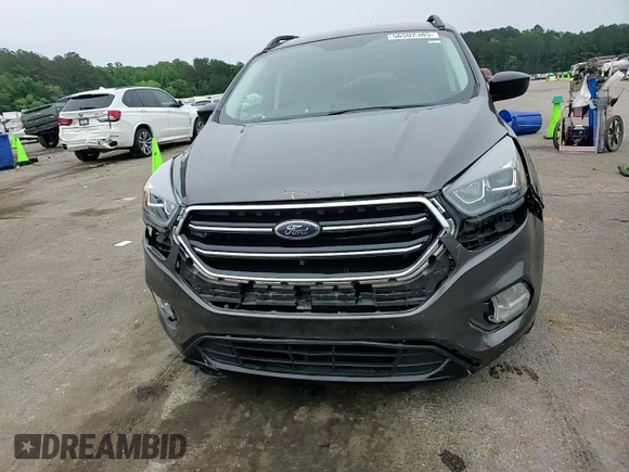 2017 Ford Escape SE z VIN 1FMCU9GD1HUB35003, wystawiony jako Copart lot #56502385 z przebiegiem 74 409 mil mil oraz Szkoda całkowita • Salvage title. Historia ofert i sprzedaży dostępna na DreamBid. Obrazek 14.