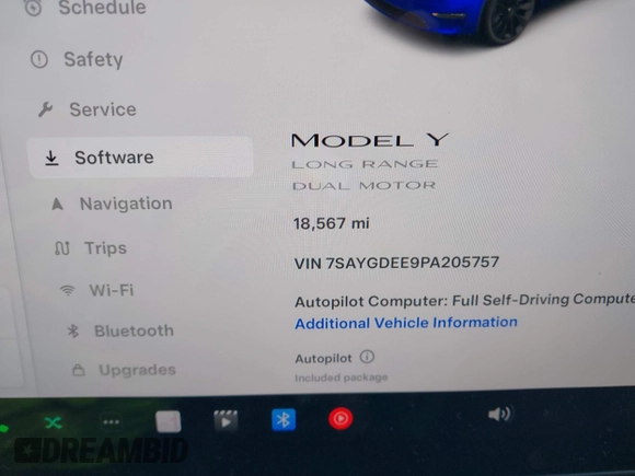 2023 Tesla Model Y Long Range with VIN 7SAYGDEE9PA205757, listed as a IAAI auction lot 41705881 with 18,567 mi miles and . Bid and sale history available at carsss.com. Image 15.