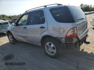 2002 Mercedes-Benz M-Class with VIN 4JGAB54E52A337189, listed as a Copart auction lot 71348154 with 220,378 mi miles and Salvage Title. Bid and sale history available at carsss.com. Image 2.