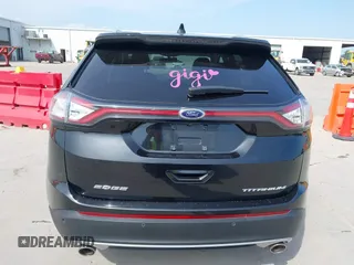 2015 Ford Edge Titanium z VIN 2FMTK3K87FBC06852, wystawiony jako IAAI lot #42335238 z przebiegiem 187 256 mil mil oraz . Historia ofert i sprzedaży dostępna na DreamBid. Obrazek 16.