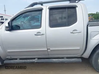 2011 Nissan Frontier Pro-4X with VIN 1N6AD0EV6BC427890, listed as a IAAI auction lot 42316203 with 259,337 mi miles and . Bid and sale history available at DreamBid. Image 14.