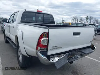 2015 Toyota Tacoma with VIN 5TFLU4EN6FX120947, listed as a IAAI auction lot 42043239 with 125,480 mi miles and . Bid and sale history available at DreamBid. Image 3.