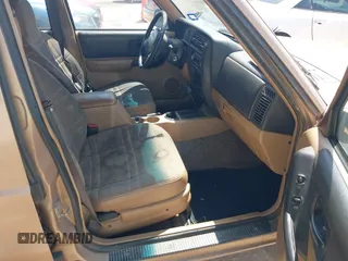 1999 Jeep Cherokee Sport with VIN 1J4FT68S1XL528885, listed as a IAAI auction lot 42536873 with Not provided miles and . Bid and sale history available at DreamBid. Image 5.