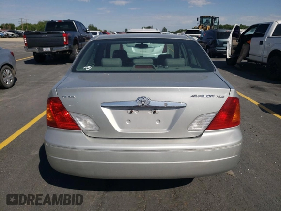 2000 Toyota Avalon XL with VIN 4T1BF28B7YU112576, listed as a Copart auction lot 59726505 with 242,412 mi miles and Salvage title. Bid and sale history available at DreamBid. Image 6.
