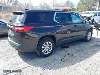 2018 Chevrolet Traverse LT Cloth with VIN 1GNERGKW2JJ263972, listed as a IAAI auction lot 41774086 with 112,296 mi miles. Bid and sale history available at carsss.com. Image 4.