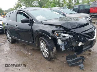 2013 Mazda CX-9 Grand Touring with VIN JM3TB3DA6D0407569, listed as a IAAI auction lot 42392788 with 183,252 mi miles and . Bid and sale history available at DreamBid. Image 1.