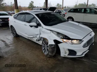 2020 Ford Fusion SE z VIN 3FA6P0T92LR173321, wystawiony jako Copart lot #86585494 z przebiegiem 102 285 mil mil oraz Szkoda całkowita • Salvage title. Historia ofert i sprzedaży dostępna na DreamBid. Obrazek 4.