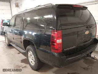2013 Chevrolet Suburban LT with VIN 1GNSKJE75DR167705, listed as a IAAI auction lot 41521409 with 228,411 mi miles. Bid and sale history available at carsss.com. Image 3.