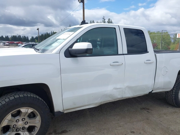 2017 Chevrolet Silverado 1500 LT with VIN 1GCVKREC7HZ131196, listed as a IAAI auction lot 42072336 with 158,140 mi miles. Bid and sale history available at carsss.com. Image 14.