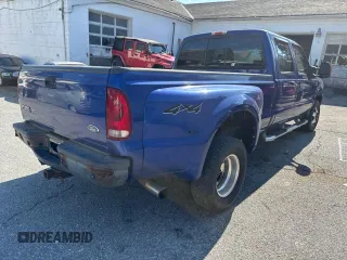 2003 Ford F-350 XL with VIN 1FTWW33P23EC02154, listed as a Copart auction lot 74262214 with 260,336 mi miles and Clean Title. Bid and sale history available at DreamBid. Image 4.