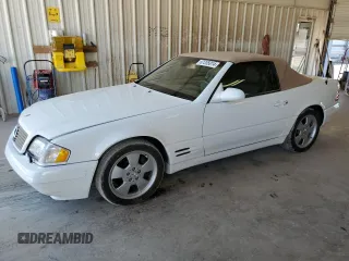1999 Mercedes-Benz SL-Class with VIN WDBFA68F2XF179134, listed as a Copart auction lot 67335014 with 68,406 mi miles and Clean Title. Bid and sale history available at carsss.com. Image 1.