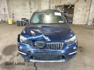 2019 BMW X1 xDrive28i with VIN WBXHT3C55K5L37338, listed as a IAAI auction lot 41934461 with 87,913 mi miles. Bid and sale history available at carsss.com. Image 12.