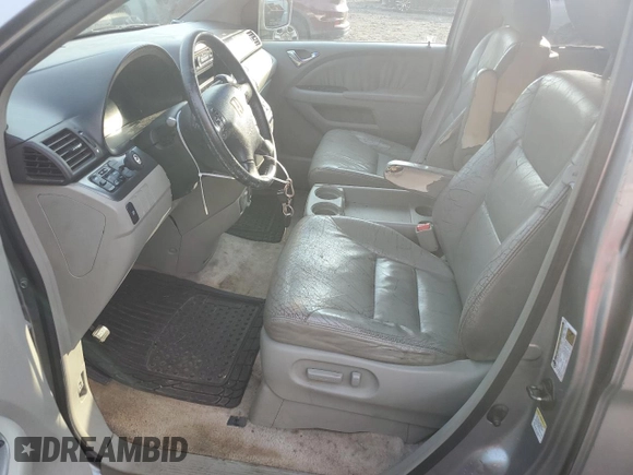 2006 Honda Odyssey EX-L z VIN 5FNRL386X6B031503, wystawiony jako Copart lot #59791425 z przebiegiem 138 624 mil mil oraz Czysty tytuł • Clean title. Historia ofert i sprzedaży dostępna na DreamBid. Obrazek 7.