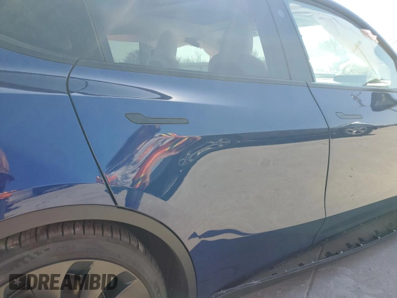 2023 Tesla Model Y Performance with VIN 7SAYGDEF5PF917808, listed as a Copart auction lot 48348615 with Not Provided miles and Salvage Title. Bid and sale history available at DreamBid. Image 11.