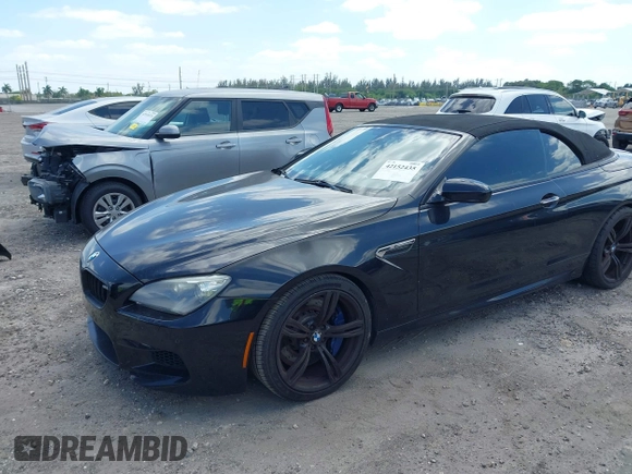 2014 BMW M6 with VIN WBSLZ9C52EDZ78748, listed as a IAAI auction lot 42152435 with 57,150 mi miles and . Bid and sale history available at DreamBid. Image 2.