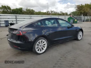 2022 Tesla Model 3 z VIN 5YJ3E1EA1NF286584, wystawiony jako Copart lot #52142755 z przebiegiem 83 340 mil mil oraz Czysty tytuł • Clean title. Historia ofert i sprzedaży dostępna na DreamBid. Obrazek 3.