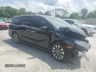 2023 Honda Odyssey EX-L with VIN 5FNRL6H6XPB018723, listed as a Copart auction lot 54877055 with 32,223 mi miles and Salvage Title. Bid and sale history available at carsss.com. Image 4.
