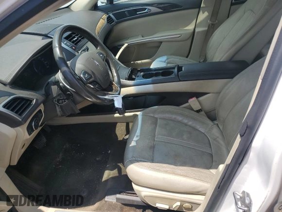 2015 Lincoln MKZ z VIN 3LN6L2G95FR626407, wystawiony jako Copart lot #63658825 z przebiegiem 121 361 mil mil oraz Szkoda całkowita • Salvage title. Historia ofert i sprzedaży dostępna na DreamBid. Obrazek 7.
