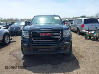 2017 GMC Sierra 1500 SLE z VIN 1GTV2MEC2HZ105964, wystawiony jako IAAI lot #42091941 z przebiegiem 93 779 mil mil oraz . Historia ofert i sprzedaży dostępna na DreamBid. Obrazek 12.