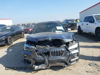 2016 BMW X1 xDrive28i with VIN WBXHT3Z35G4A49941, listed as a IAAI auction lot 41789774 with 111,661 mi miles and . Bid and sale history available at DreamBid. Image 12.