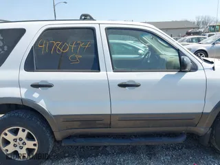 2004 Ford Escape XLT with VIN 1FMYU93164KA96674, listed as a IAAI auction lot 41780474 with 182,525 mi miles. Bid and sale history available at carsss.com. Image 13.