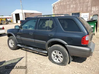 2003 Isuzu Rodeo with VIN 4S2CK58W634313617, listed as a Copart auction lot 70144664 with 179,921 mi miles and Clean Title. Bid and sale history available at DreamBid. Image 2.