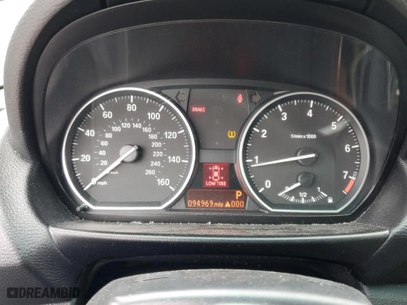 2011 BMW 1 Series 128i with VIN WBAUN1C5XBVH82605, listed as a Copart auction lot 73457334 with 94,969 mi miles and Salvage Title. Bid and sale history available at carsss.com. Image 9.