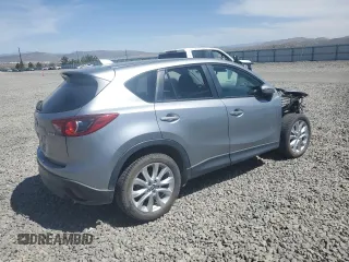 2015 Mazda CX-5 Grand Touring with VIN JM3KE4DY5F0540655, listed as a Copart auction lot 52893155 with 152,279 mi miles and Salvage Title. Bid and sale history available at carsss.com. Image 3.