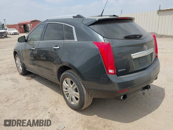2014 Cadillac SRX Luxury Collection with VIN 3GYFNBE33ES599058, listed as a IAAI auction lot 42080556 with 128,917 mi miles. Bid and sale history available at carsss.com. Image 3.