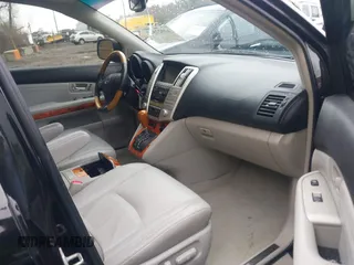 2007 Lexus RX 350 with VIN 2T2HK31U17C028157, listed as a IAAI auction lot 42027517 with 185,440 mi miles. Bid and sale history available at carsss.com. Image 5.