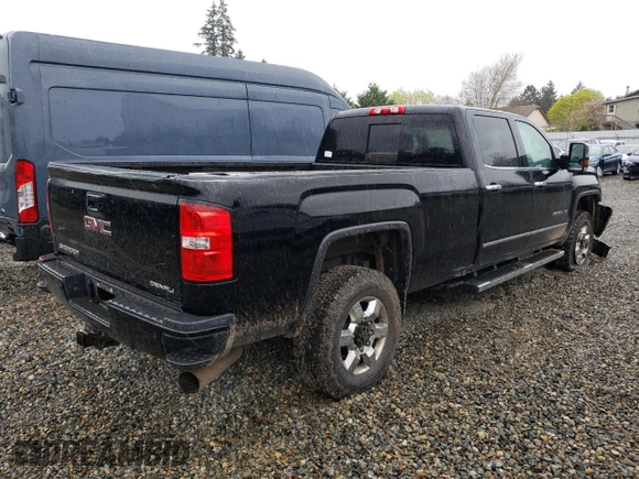 2016 GMC Sierra 3500HD Denali z VIN 1GT42YE82GF140938, wystawiony jako Copart lot #52556095 z przebiegiem 136 654 mil mil oraz Szkoda całkowita • Salvage title. Historia ofert i sprzedaży dostępna na DreamBid. Obrazek 3.