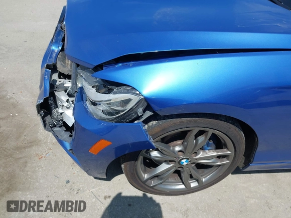 2014 BMW 2 Series M235i with VIN WBA1J7C52EVW84588, listed as a IAAI auction lot 42490194 with 103,998 mi miles and . Bid and sale history available at DreamBid. Image 17.