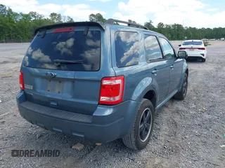 2011 Ford Escape XLT with VIN 1FMCU0D74BKA42232, listed as a IAAI auction lot 42144143 with 231,025 mi miles. Bid and sale history available at carsss.com. Image 4.