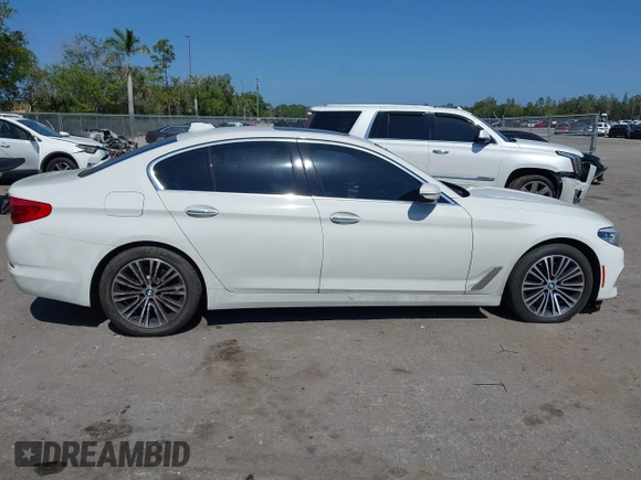 2018 BMW 5 Series 530i z VIN WBAJA5C53JG898590, wystawiony jako IAAI lot #42143629 z przebiegiem 135 111 mil mil oraz . Historia ofert i sprzedaży dostępna na DreamBid. Obrazek 14.