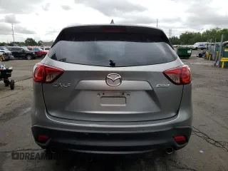2013 Mazda CX-5 Sport z VIN JM3KE4BE4D0147672, wystawiony jako Copart lot #61617215 z przebiegiem 264 421 mil mil oraz Czysty tytuł • Clean title. Historia ofert i sprzedaży dostępna na DreamBid. Obrazek 6.