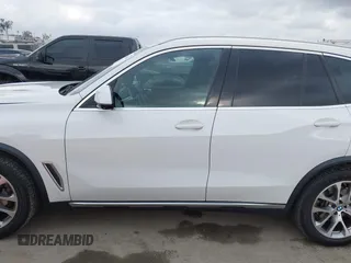 2021 BMW X5 xDrive40i with VIN 5UXCR6C03M9G36156, listed as a IAAI auction lot 42125009 with 30,877 mi miles. Bid and sale history available at carsss.com. Image 14.