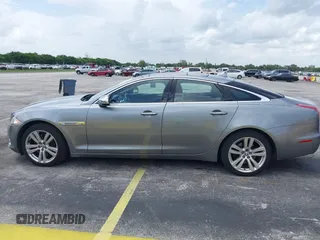 2013 Jaguar XJ with VIN SAJWJ1CD4D8V46305, listed as a IAAI auction lot 42637329 with 101,532 mi miles and . Bid and sale history available at DreamBid. Image 14.