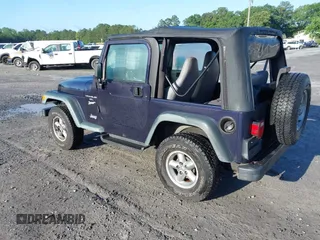 1998 Jeep Wrangler Sport with VIN 1J4FY19S8WP798559, listed as a IAAI auction lot 42162734 with 129,638 mi miles and . Bid and sale history available at DreamBid. Image 3.