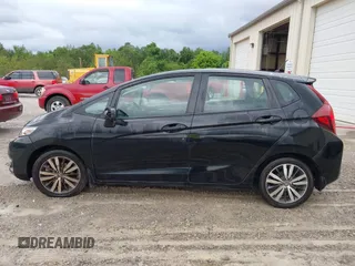 2015 Honda Fit EX-L z VIN 3HGGK5H8XFM733048, wystawiony jako IAAI lot #42267517 z przebiegiem Nie podano mil oraz . Historia ofert i sprzedaży dostępna na DreamBid. Obrazek 14.