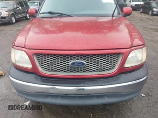 2000 Ford F-150 XL with VIN 1FTRX17W5YNB91724, listed as a IAAI auction lot 41954818 with 156,718 mi miles. Bid and sale history available at carsss.com. Image 6.