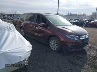 2018 Honda Odyssey EX-L with VIN 5FNRL6H73JB028770, listed as a IAAI auction lot 41984094 with 96,819 mi miles. Bid and sale history available at carsss.com. Image 1.