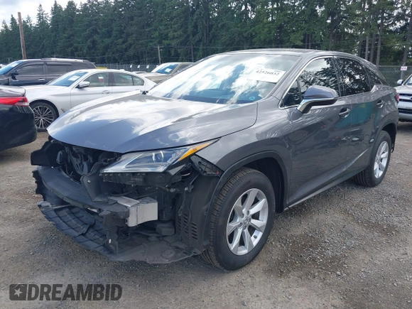 2016 Lexus RX 350 z VIN 2T2BZMCA7GC020199, wystawiony jako IAAI lot #42526032 z przebiegiem 84 821 mil mil oraz . Historia ofert i sprzedaży dostępna na DreamBid. Obrazek 18.