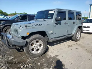 2014 Jeep Wrangler Unlimited Sahara z VIN 1C4BJWEG7EL278530, wystawiony jako Copart lot #58322675 z przebiegiem 85 979 mil mil oraz Szkoda całkowita • Salvage title. Historia ofert i sprzedaży dostępna na DreamBid. Obrazek 1.
