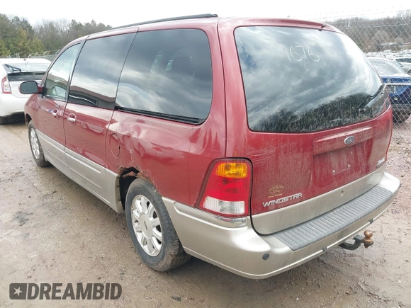 2003 Ford Windstar LTD with VIN 2FMDA58453BB87107, listed as a IAAI auction lot 42081676 with 164,638 mi miles and . Bid and sale history available at carsss.com. Image 3.