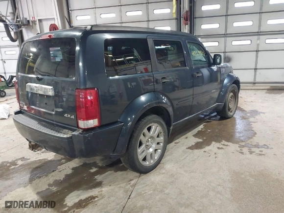 2008 Dodge Nitro SLT with VIN 1D8GU58K68W223532, listed as a IAAI auction lot 41259900 with 156,956 mi miles. Bid and sale history available at carsss.com. Image 4.
